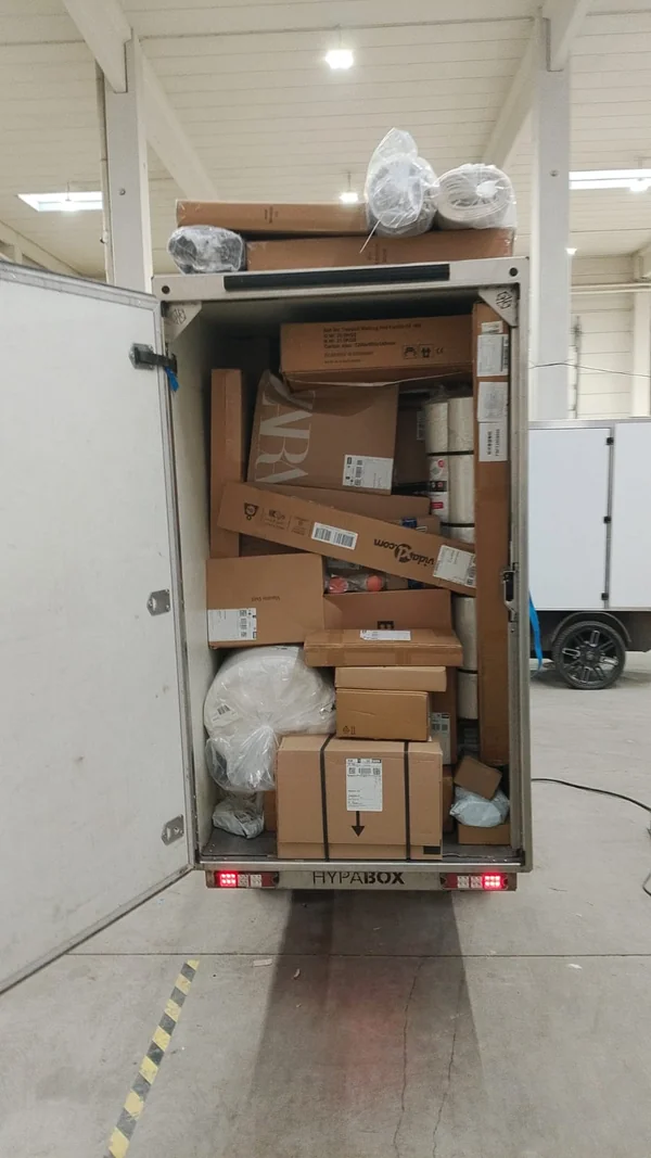 Loaded trailer with parcels at the depot